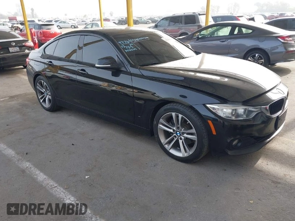 2015 BMW 4 Series 428i with VIN WBA4A9C52FGL85228, listed as a IAAI auction lot 41228043 with 152,729 mi miles and . Bid and sale history available at DreamBid. Image 1.
