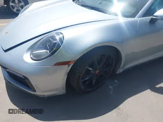 2020 Porsche 911 Carrera S z VIN WP0AB2A90LS229570, wystawiony jako IAAI lot #42242278 z przebiegiem 15 967 mil mil oraz . Historia ofert i sprzedaży dostępna na DreamBid. Obrazek 6.
