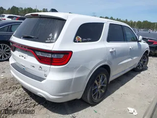 2014 Dodge Durango SXT with VIN 1C4RDHAG5EC313816, listed as a IAAI auction lot 41887135 with 101,212 mi miles. Bid and sale history available at carsss.com. Image 4.