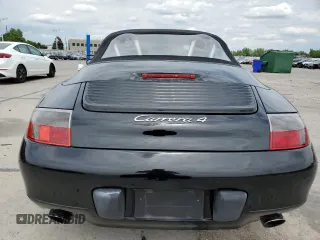 2000 Porsche 911 z VIN WP0CA2998YS650752, wystawiony jako Copart lot #58339415 z przebiegiem 68 854 mil mil oraz Szkoda całkowita • Salvage title. Historia ofert i sprzedaży dostępna na DreamBid. Obrazek 6.