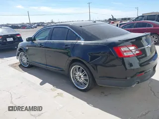 2014 Ford Taurus SEL with VIN 1FAHP2E83EG184976, listed as a IAAI auction lot 41590153 with 177,342 mi miles. Bid and sale history available at carsss.com. Image 3.