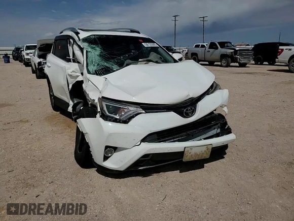 2018 Toyota RAV4 XLE with VIN JTMWFREV9JJ187834, listed as a Copart auction lot 56125505 with Not provided miles and Salvage title. Bid and sale history available at DreamBid. Image 14.