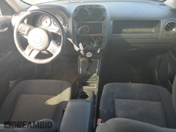 2011 Jeep Patriot Sport with VIN 1J4NF1GB6BD141811, listed as a Copart auction lot 77320484 with 123,966 mi miles and Salvage Title. Bid and sale history available at DreamBid. Image 8.