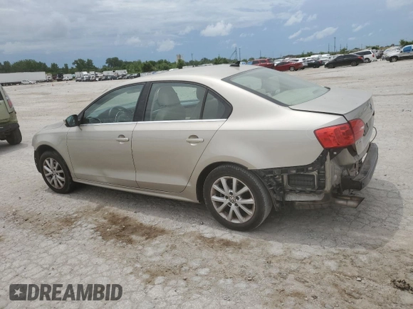 2014 Volkswagen Jetta SE with VIN 3VWD07AJ6EM209228, listed as a Copart auction lot 60500525 with 118,261 mi miles and Salvage title. Bid and sale history available at DreamBid. Image 2.