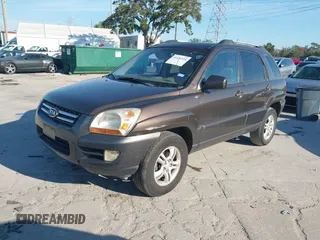 2005 Kia Sportage LX z VIN KNDJF723757132772, wystawiony jako IAAI lot #41436925 z przebiegiem 134 653 mil mil oraz . Historia ofert i sprzedaży dostępna na DreamBid. Obrazek 2.
