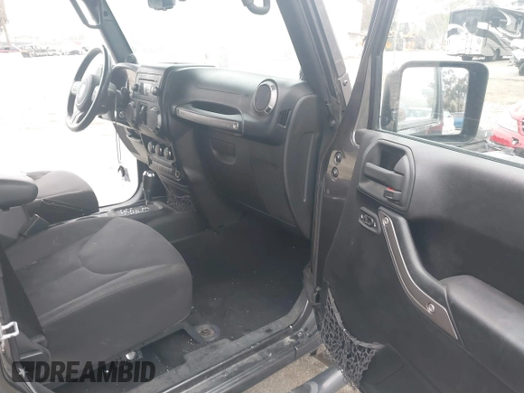 2014 Jeep Wrangler Unlimited Sport with VIN 1C4BJWDG7EL244749, listed as a IAAI auction lot 41871127 with 128,420 mi miles and . Bid and sale history available at DreamBid. Image 5.