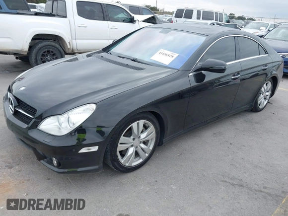 2009 Mercedes-Benz CLS-Class 5.5L with VIN WDDDJ72X99A141289, listed as a IAAI auction lot 41436528 with 126,649 mi miles. Bid and sale history available at carsss.com. Image 2.