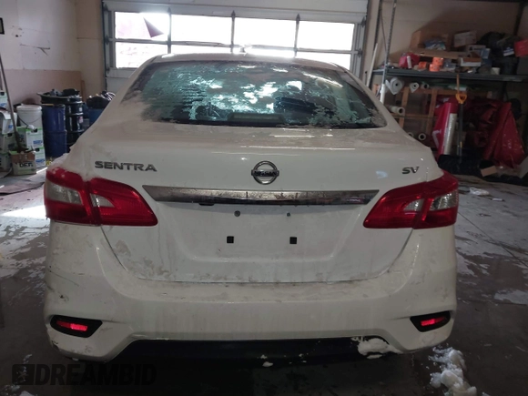 2019 Nissan Sentra S z VIN 3N1AB7AP9KY325065, wystawiony jako IAAI lot #41612204 z przebiegiem 141 818 mil mil oraz . Historia ofert i sprzedaży dostępna na DreamBid. Obrazek 16.