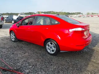 2015 Ford Fiesta SE with VIN 3FADP4BJ6FM132489, listed as a IAAI auction lot 41975658 with 115,653 mi miles. Bid and sale history available at carsss.com. Image 3.