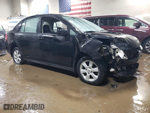 2011 Nissan Versa S with VIN 3N1BC1AP7BL410790, listed as a Copart auction lot 83893614 with 151,077 mi miles and Salvage title. Bid and sale history available at DreamBid. Image 4.