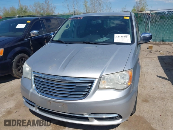 2011 Chrysler Town & Country Touring L with VIN 2A4RR8DG8BR797653, listed as a IAAI auction lot 42115304 with 185,613 mi miles and . Bid and sale history available at DreamBid. Image 12.