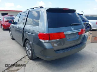2010 Honda Odyssey Touring with VIN 5FNRL3H90AB053710, listed as a IAAI auction lot 42577646 with 255,351 mi miles and . Bid and sale history available at DreamBid. Image 3.