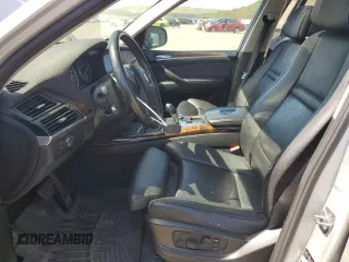 2012 BMW X5 35i with VIN 5UXZV4C5XCL749204, listed as a Copart auction lot 62012985 with 94,636 mi miles and Clean title. Bid and sale history available at DreamBid. Image 7.