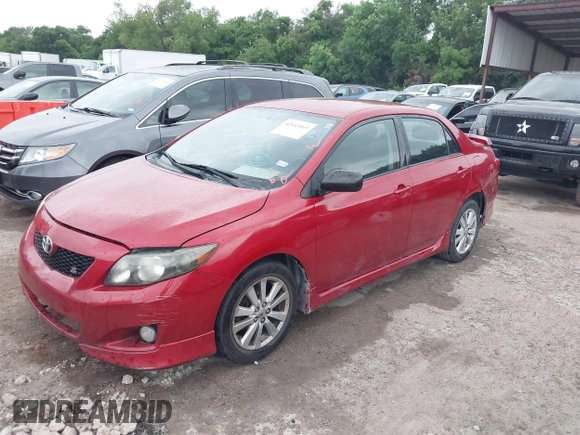 2010 Toyota Corolla with VIN 1NXBU4EE5AZ291903, listed as a IAAI auction lot 42143469 with 123,747 mi miles and . Bid and sale history available at DreamBid. Image 2.