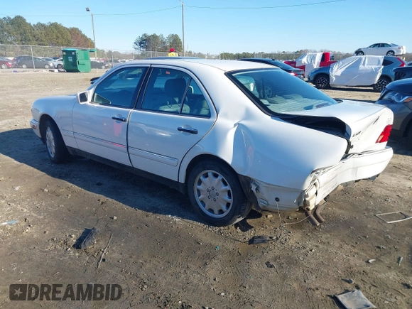 1999 Mercedes-Benz E-Class with VIN WDBJF82H0XX015778, listed as a IAAI auction lot 41269886 with 184,011 mi miles. Bid and sale history available at carsss.com. Image 3.