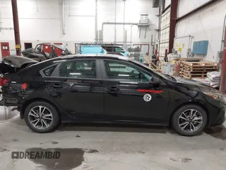 2023 Kia Forte LXS z VIN 3KPF24AD4PE646186, wystawiony jako IAAI lot #42137342 z przebiegiem 15 866 mil mil oraz . Historia ofert i sprzedaży dostępna na DreamBid. Obrazek 14.