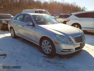 2013 Mercedes-Benz E-Class E 350 Luxury with VIN WDDHF8JB0DA768616, listed as a IAAI auction lot 41327288 with 142,125 mi miles. Bid and sale history available at carsss.com. Image 1.