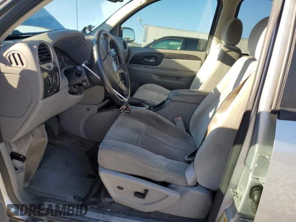 2009 GMC Envoy SLE with VIN 1GKDS33S492129469, listed as a Copart auction lot 83232024 with 131,735 mi miles and Salvage Title. Bid and sale history available at carsss.com. Image 7.