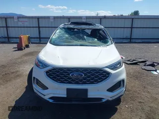 2020 Ford Edge Titanium z VIN 2FMPK4K96LBB46218, wystawiony jako IAAI lot #42750160 z przebiegiem 56 720 mil mil oraz . Historia ofert i sprzedaży dostępna na DreamBid. Obrazek 13.