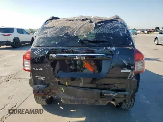 2015 Jeep Compass High Altitude Edition with VIN 1C4NJDEB2FD408957, listed as a Copart auction lot 52639735 with 129,767 mi miles and Salvage Title. Bid and sale history available at carsss.com. Image 6.