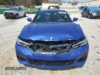 2021 BMW 3 Series 330i with VIN 3MW5R1J0XM8C03213, listed as a Copart auction lot 49026035 with 54,051 mi miles and Salvage Title. Bid and sale history available at carsss.com. Image 5.