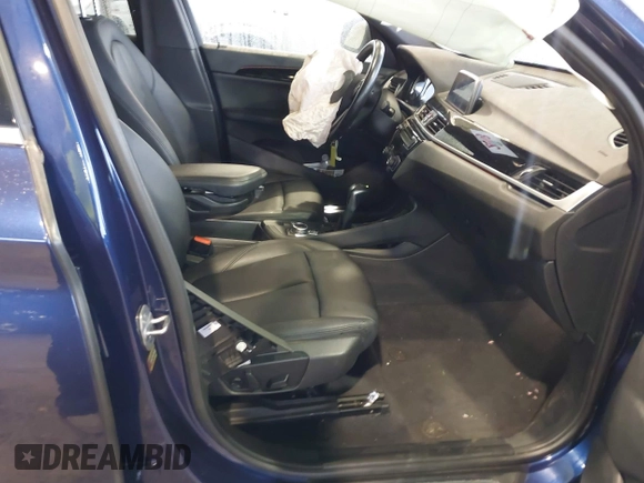 2019 BMW X1 xDrive28i with VIN WBXHT3C55K5L37338, listed as a IAAI auction lot 41934461 with 87,913 mi miles. Bid and sale history available at carsss.com. Image 5.
