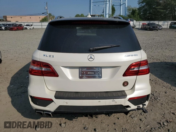 2014 Mercedes-Benz M 63 AMG z VIN 4JGDA7EB6EA344690, wystawiony jako Copart lot #59296955 z przebiegiem 98 090 mil mil oraz Czysty tytuł • Clean title. Historia ofert i sprzedaży dostępna na DreamBid. Obrazek 6.