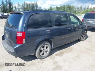 2008 Dodge Grand Caravan SE with VIN 1D8HN44H78B126241, listed as a IAAI auction lot 42245918 with 137,424 mi miles and . Bid and sale history available at DreamBid. Image 4.