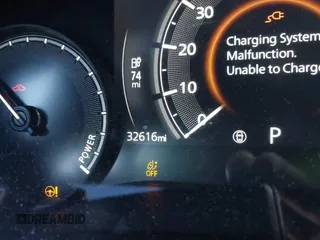 2022 Mazda MX-30 Premium Plus z VIN JM1DRADB6N0100295, wystawiony jako IAAI lot #41885035 z przebiegiem 32 616 mil mil oraz . Historia ofert i sprzedaży dostępna na DreamBid. Obrazek 16.