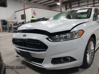 2013 Ford Fusion SE Hybrid with VIN 3FA6P0LU7DR254983, listed as a IAAI auction lot 41883531 with 188,585 mi miles and . Bid and sale history available at carsss.com. Image 14.