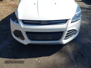 2016 Ford Escape SE with VIN 1FMCU0G9XGUB90670, listed as a IAAI auction lot 41694382 with 167,631 mi miles. Bid and sale history available at carsss.com. Image 12.