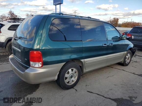 2002 Kia Sedona LX with VIN KNDUP131426217512, listed as a Copart auction lot 80928774 with 163,176 mi miles and Salvage Title. Bid and sale history available at carsss.com. Image 3.
