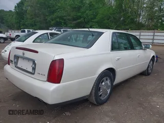 2003 Cadillac DeVille with VIN 1G6KD54Y93U179035, listed as a IAAI auction lot 42114653 with 112,591 mi miles. Bid and sale history available at carsss.com. Image 4.