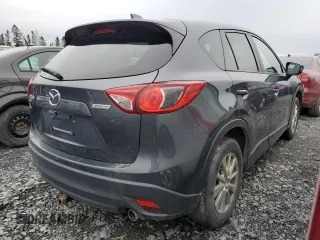 2014 Mazda CX-5 Sport with VIN JM3KE4BE0E0428322, listed as a Copart auction lot 56012495 with 278,146 mi miles and Salvage title. Bid and sale history available at DreamBid. Image 3.