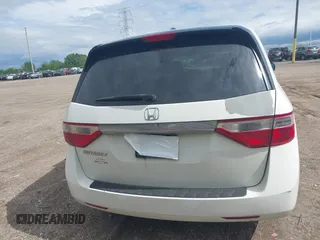2012 Honda Odyssey EX-L with VIN 5FNRL5H63CB117341, listed as a IAAI auction lot 42197815 with 256,544 mi miles and . Bid and sale history available at DreamBid. Image 16.