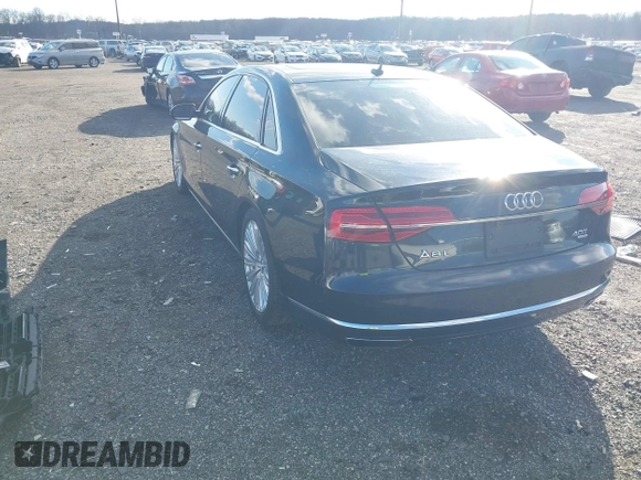 2015 Audi A8 L 4.0T with VIN WAU32AFD4FN014063, listed as a IAAI auction lot 41501970 with 158,570 mi miles. Bid and sale history available at carsss.com. Image 3.