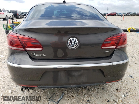 2014 Volkswagen CC R-Line with VIN WVWBN7ANXEE507477, listed as a Copart auction lot 58546374 with 73,792 mi miles and Salvage Title. Bid and sale history available at carsss.com. Image 6.