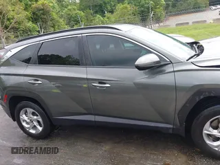 2023 Hyundai Tucson SEL z VIN 5NMJBCAE4PH238244, wystawiony jako IAAI lot #42264684 z przebiegiem 41 634 mil mil oraz . Historia ofert i sprzedaży dostępna na DreamBid. Obrazek 13.