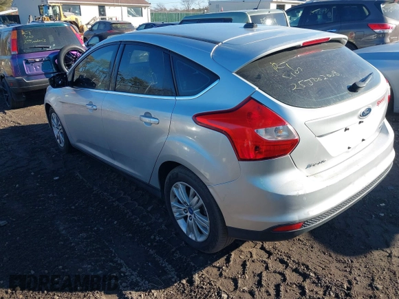 2012 Ford Focus SEL with VIN 1FAHP3M28CL162768, listed as a IAAI auction lot 41682973 with 999,999 mi miles. Bid and sale history available at carsss.com. Image 3.
