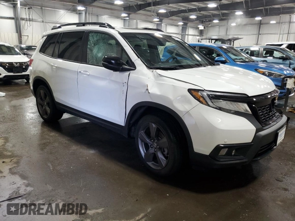 2020 Honda Passport Touring с VIN 5FNYF8H98LB000918, выставлен на аукционе Copart как лот 46877405 с пробегом 49 031 миль миль и Списание • Salvage title. История ставок и продаж доступна на DreamBid. Изображение 4.