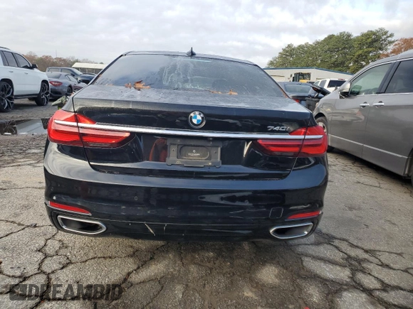 2018 BMW 7 Series 740i with VIN WBA7E2C58JG743269, listed as a Copart auction lot 84905044 with 74,951 mi miles and Salvage Title. Bid and sale history available at carsss.com. Image 6.