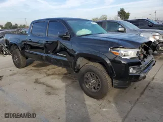 2017 Toyota Tacoma SR5 with VIN 3TMDZ5BN2HM030199, listed as a Copart auction lot 82649564 with 68,144 mi miles and Salvage Title. Bid and sale history available at carsss.com. Image 4.