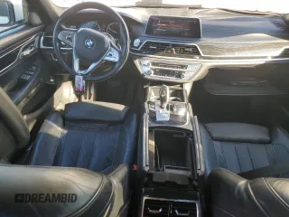 2016 BMW 7 Series 750i with VIN WBA7F0C56GGL99161, listed as a Copart auction lot 87652655 with 97,805 mi miles and Salvage Title. Bid and sale history available at carsss.com. Image 8.