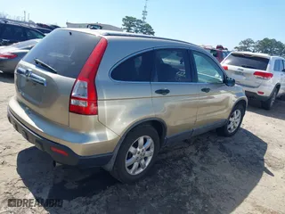 2007 Honda CR-V EX with VIN JHLRE38587C029980, listed as a IAAI auction lot 41789624 with 213,517 mi miles. Bid and sale history available at carsss.com. Image 4.