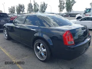 2007 Chrysler 300 with VIN 2C3KA43R57H852331, listed as a IAAI auction lot 41946742 with 211,168 mi miles. Bid and sale history available at carsss.com. Image 3.