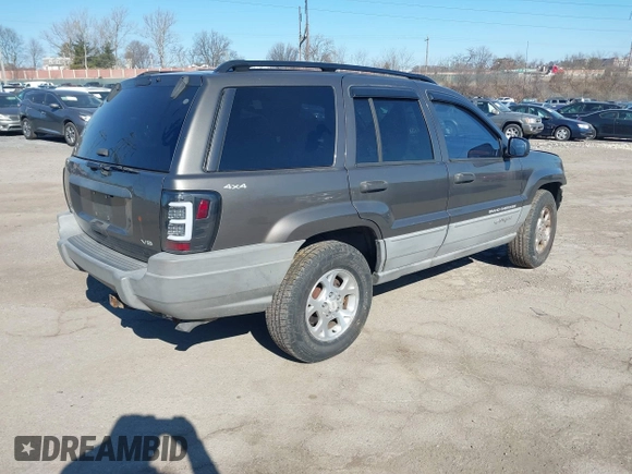 1999 Jeep Grand Cherokee Laredo with VIN 1J4GW58NXXC623753, listed as a IAAI auction lot 41685540 with 190,134 mi miles and . Bid and sale history available at DreamBid. Image 4.