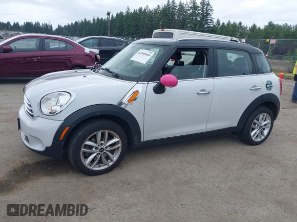 2014 MINI Countryman with VIN WMWZB3C5XEWR37594, listed as a IAAI auction lot 42500466 with 67,589 mi miles and . Bid and sale history available at DreamBid. Image 2.