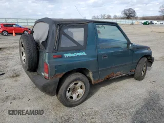 1996 Chevrolet Tracker z VIN 2CNBJ1863T6925397, wystawiony jako Copart lot #50446605 z przebiegiem 139 484 mil mil oraz Czysty tytuł • Clean title. Historia ofert i sprzedaży dostępna na DreamBid. Obrazek 3.