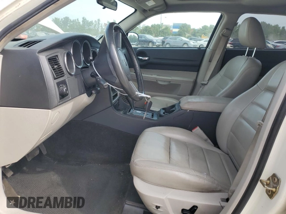 2006 Dodge Magnum SXT with VIN 2D4GZ47V16H149067, listed as a Copart auction lot 67564774 with 238,207 mi miles and Salvage Title. Bid and sale history available at DreamBid. Image 7.