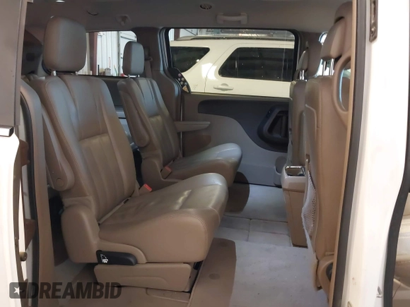 2015 Chrysler Town & Country Touring with VIN 2C4RC1BG9FR626482, listed as a IAAI auction lot 41879865 with 129,694 mi miles and . Bid and sale history available at DreamBid. Image 8.